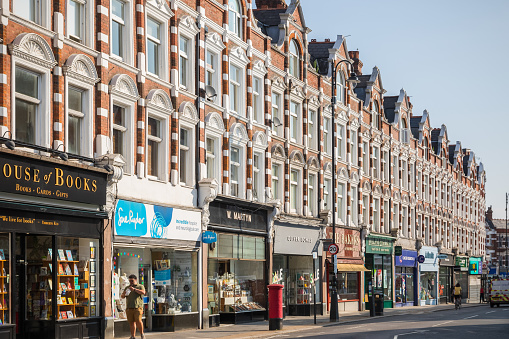 London, UK - 20 July, 2022 - A mixture of high street and independent shops on Muswell Hill Broadway