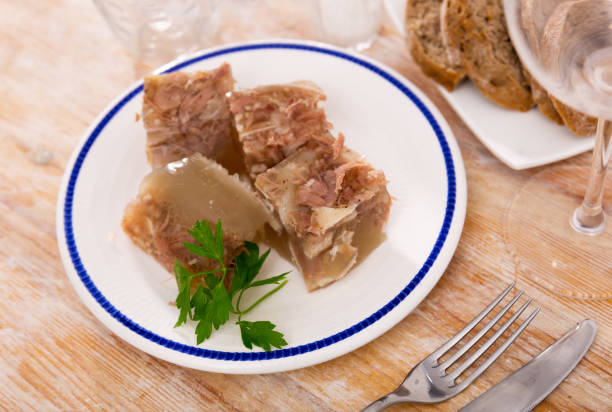 istock Kholodets served on table with parsley sprig 1424197281