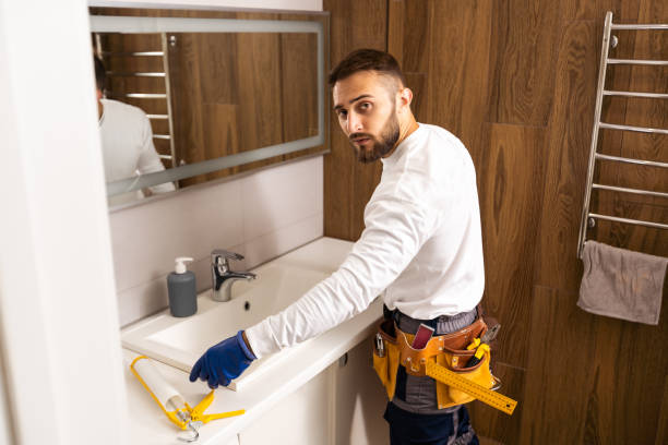 istock plumber service. wash basin installation 1424202344