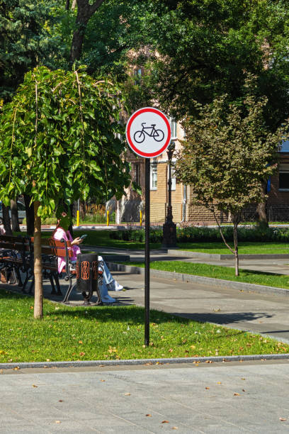 Sign prohibiting cycling in the city park stock photo