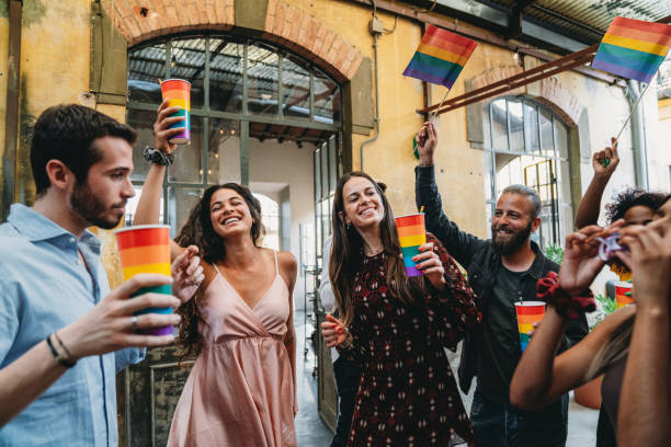 istock People dancing at an LGBTQIA pride event party 1424205194