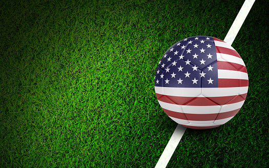 American flag on a soccer ball over soccer field. Easy to crop for all your social media and design need.