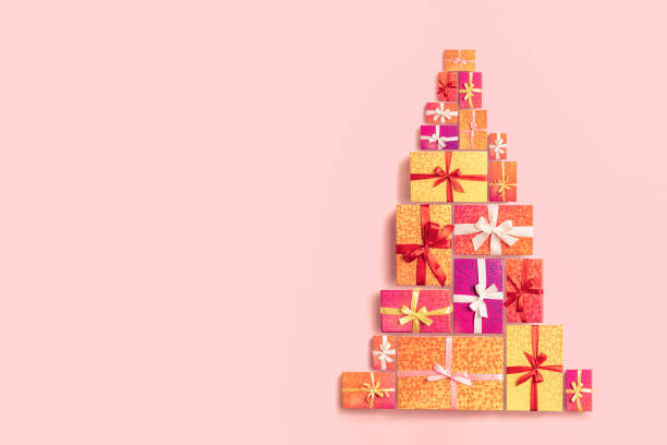 istock Christmas gift boxes as shape of a Christmas tree. Top view, layout, copy space template 1424206476