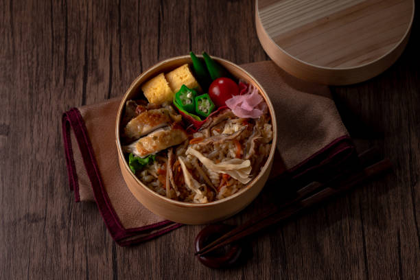 Japanese styled lunch in the wooden lunch box made from cedar.