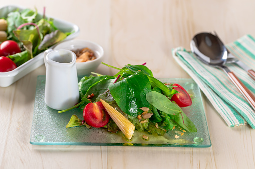 Preparing healthy green salad