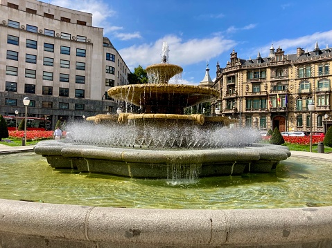 People are visiting the town square. Porto City Hall (Pacos do Concelho) and City Sign - Porto, Portugal.