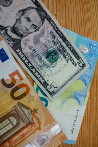 istock euro and dollar banknotes. Financial concept 1424210863