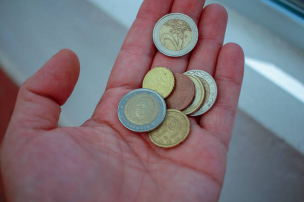 istock some euro coins to pay for bread 1424212168