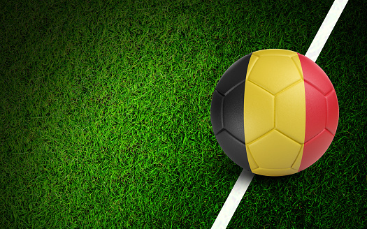 Belgian flag on a soccer ball over soccer field. Easy to crop for all your social media and design need.