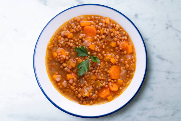 istock Lentils with carrots. Traditional northern spanish tapa. 1424213285