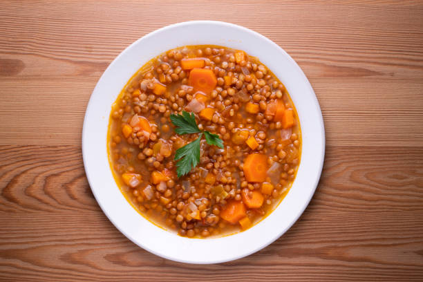 istock Lentils with carrots. Traditional northern spanish tapa. 1424213599
