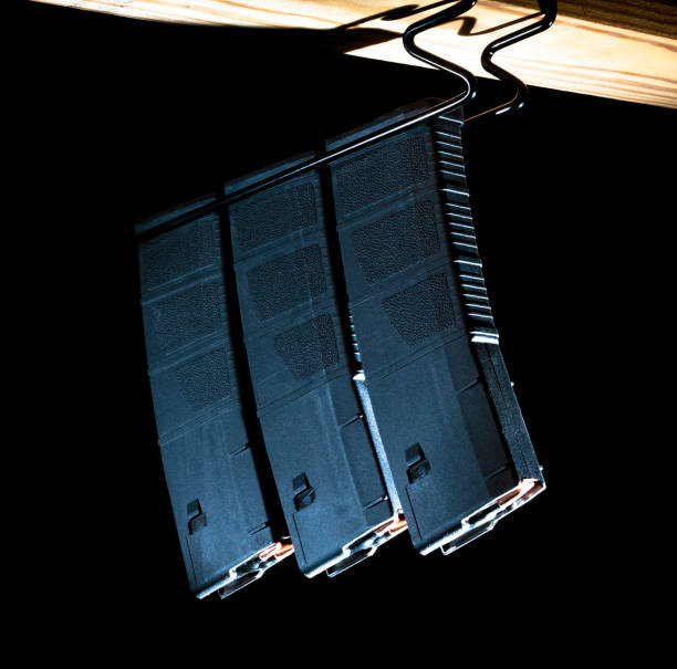 istock High capacity AR15 magazines hanging on a rack 1424219459