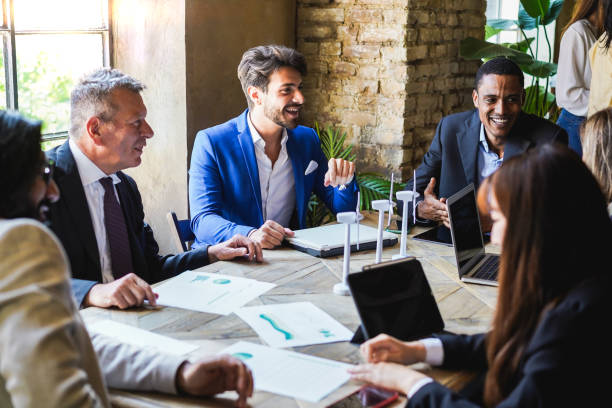 istock Multiracial business people working on sustainable innovation project - Focus on african man face 1424220875