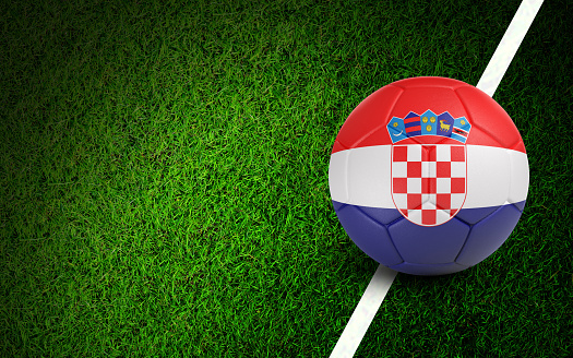 Croatian flag on a soccer ball over soccer field. Easy to crop for all your social media and design need.