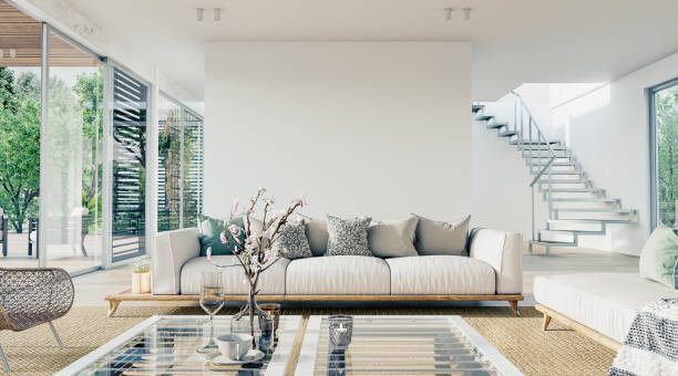 istock Cozy, luxury, and modern living room with sofa, windows and decoration 1424226834