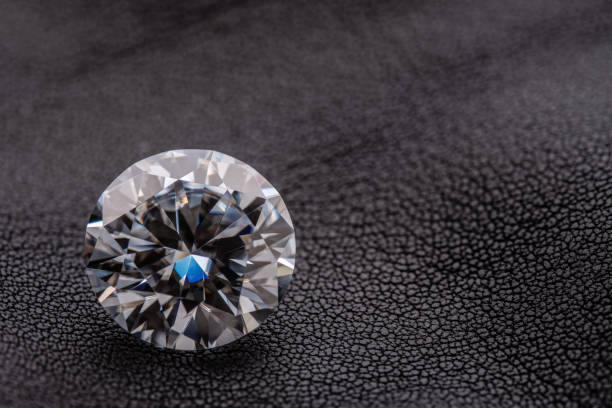 istock Diamond on Luxury Brown Leather Background 1424227870