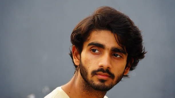 istock close up face of indian man 1424228828