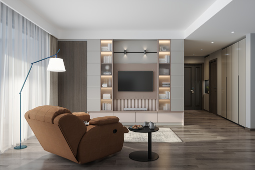 Living Room Interior With Television Set, Rear View Of Tv Chair, Floor Lamp And Coffee Table