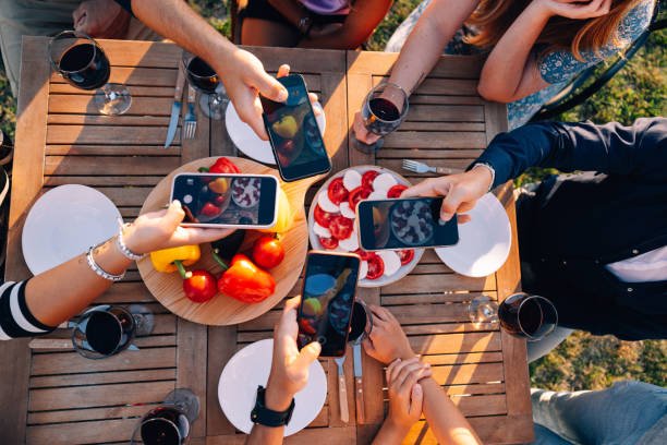 istock BBQ dinner party with friends at new house backyard 1424230589