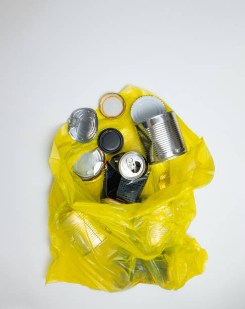 istock garbage sorting, metal, yellow garbage bag with metal garbage 1424236031