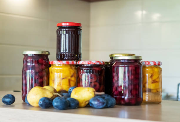 istock Preserving organic fruit in jars  for winter. 1424240718