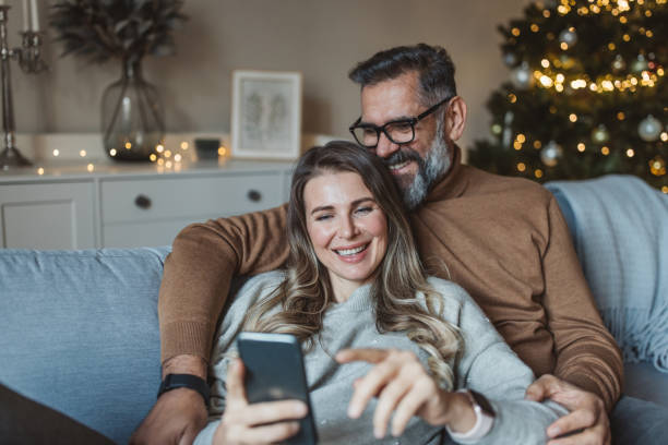 Mature couple at home for Christmas