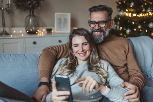 istock Mature couple at home for Christmas 1424242336