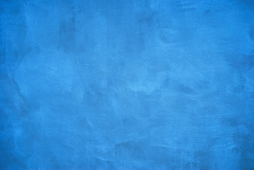Blue painted wall texture background.
