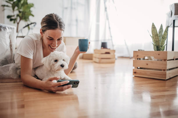 istock Woman relaxing in new home 1424245020