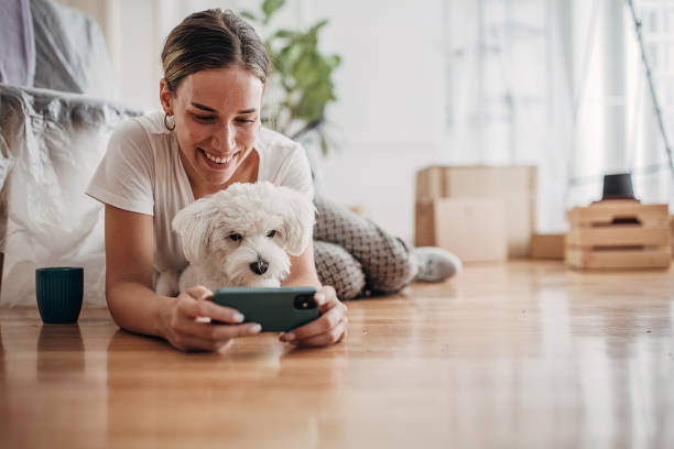 istock Woman relaxing in new home 1424245145