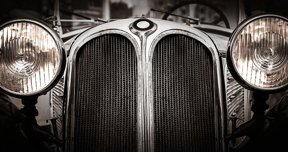 Close-Up Of Vintage Car. Sepia toned.