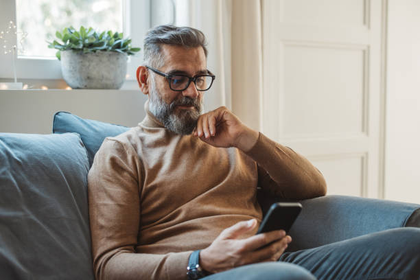 istock Mature man at home for Christmas 1424245570