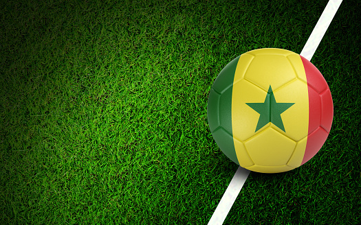 Senegalese flag on a soccer ball over soccer field. Easy to crop for all your social media and design need.