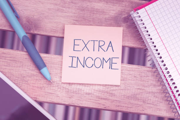 istock Conceptual display Extra Income. Business overview Additional fund received or earned from a non regular basis 1424249250