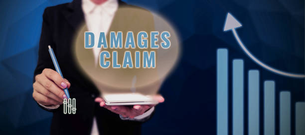 istock Writing displaying text Damages Claim. Internet Concept Demand Compensation Litigate Insurance File Suit 1424249453
