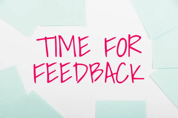Photo of Writing displaying text Time For FeedbackNeed to response or give critic on something Evaluation. Business idea Need to response or give critic on something Evaluation