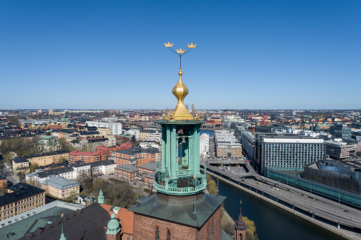 Stockholm City Hall Roof and Golden Crowns on the Top. Sweden. Drone Point of View