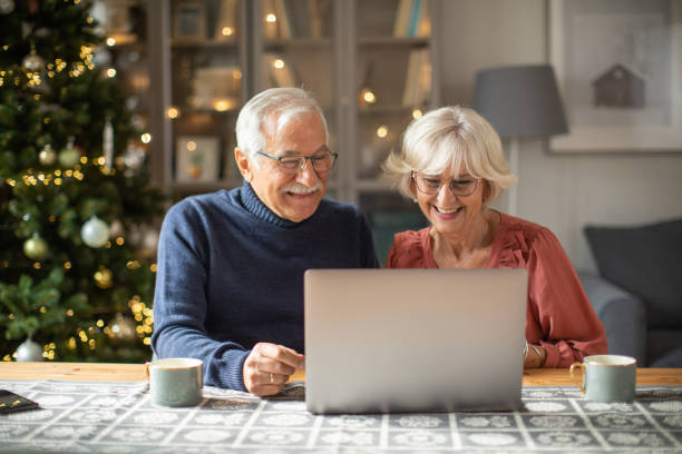 istock Senior couple for Christmas at home 1424251628