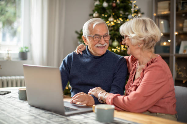 istock Senior couple for Christmas at home 1424251632