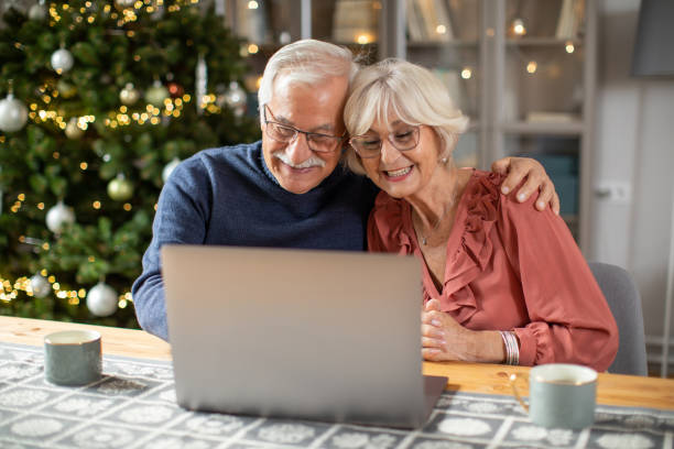 istock Senior couple for Christmas at home 1424251662
