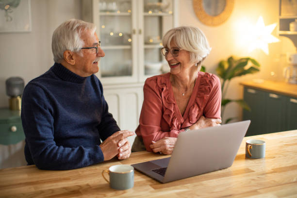istock Senior couple for Christmas at home 1424251810