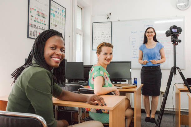 istock Portrait of a smiling multiracial group of students attending class 1424251848