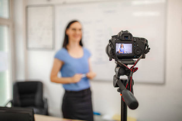 istock Female teacher teaching chemistry for an online class 1424251898