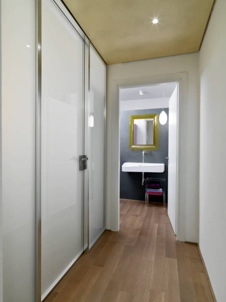 istock modern corridor with a wooden floor  overlooking the bathroom 1424257853