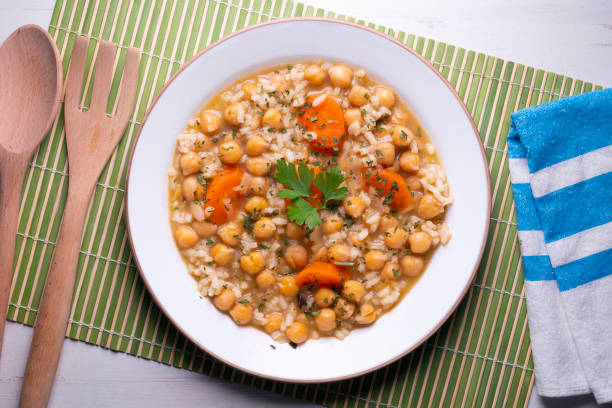 istock Chickpea stew with rice and carrots. Typical Spanish gastronomy dish. 1424267519