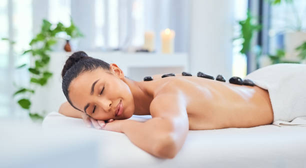 Luxury wellness spa massage, oil hot stone beauty treatment and stress relief physical therapy. Woman relax at salon, happy healthy girl self care lifestyle and cosmetic skincare routine. Luxury wellness spa massage, oil hot stone beauty treatment and stress relief physical therapy. Woman relax at salon, happy healthy girl self care lifestyle and cosmetic skincare routine. spa stock pictures, royalty-free photos & images