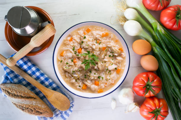 istock Soupy rice with artichokes and carrots. Typical Spanish gastronomy platter. 1424269182