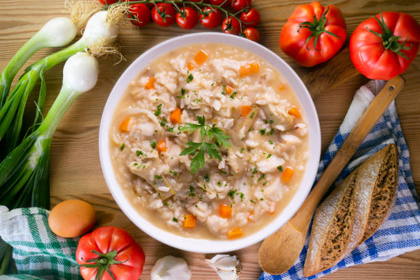istock Soupy rice with artichokes and carrots. Typical Spanish gastronomy platter. 1424269183