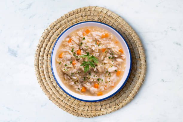 istock Soupy rice with artichokes and carrots. Typical Spanish gastronomy platter. 1424269186