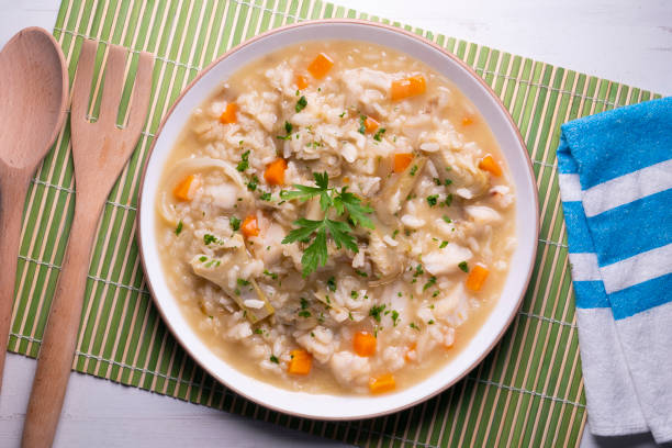 istock Soupy rice with artichokes and carrots. Typical Spanish gastronomy platter. 1424269501